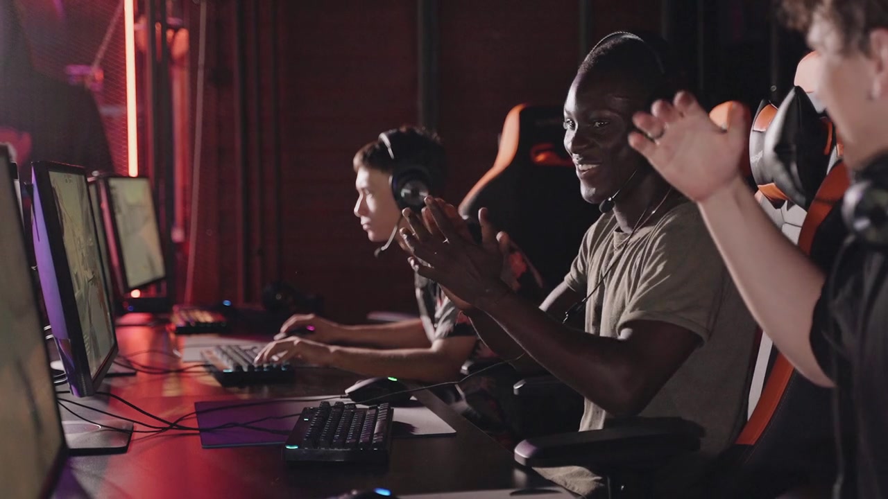 Esports Gamers Competing at a Gaming Setup
